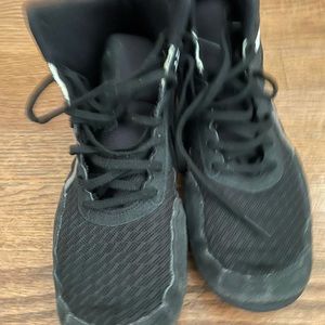 Black and white wrestling shoes